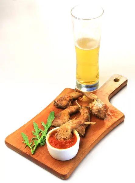 Food, chicken legs on a wooden tray — Stock Photo, Image