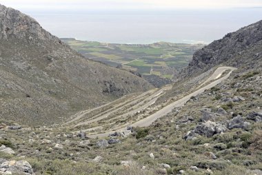 The road from Kallikratis to Kapsodasos, the most hairpinned road of  Crete, Greece clipart