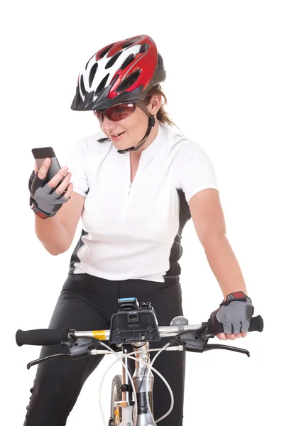 Menina ciclista falando ao telefone — Fotografia de Stock