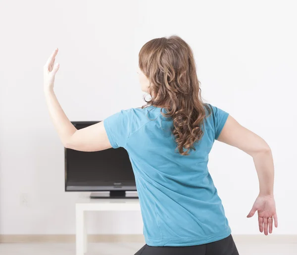 Woman exercisng at home — Stock Photo, Image