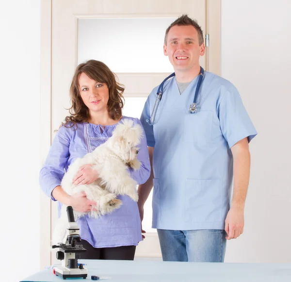 Vet dog and client — Stock Photo, Image