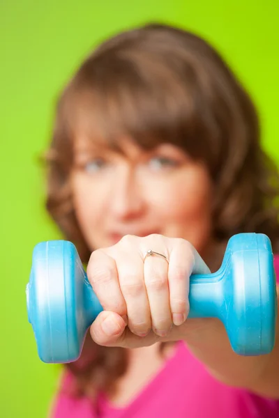 Young woman with dumbbell — Stock Photo, Image