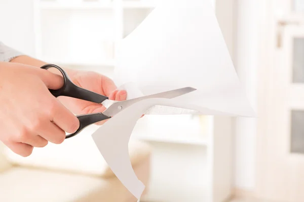 Cutting sheet of paper — Stock Photo, Image