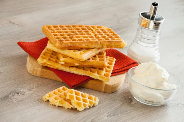 Waffles with whipped cream — Stock Photo, Image