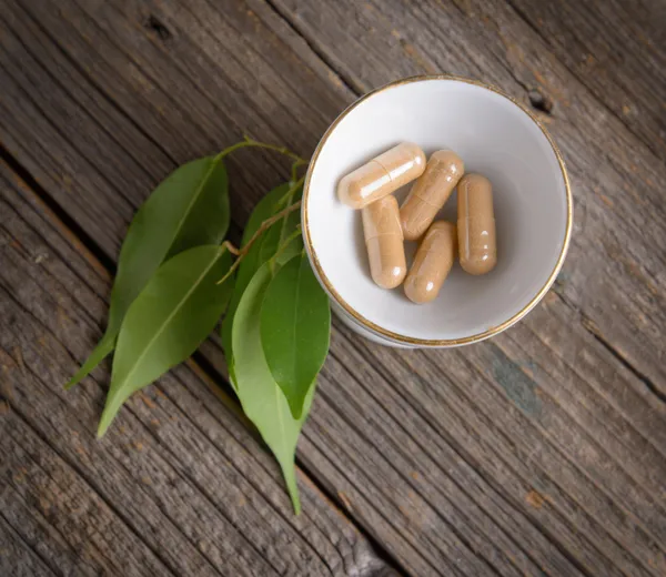 Herbal capsules — Stock Photo, Image