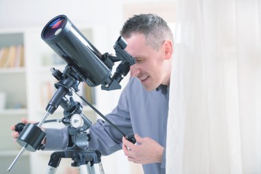 Man with telescope clipart