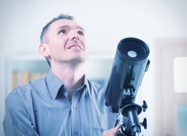 Man with telescope clipart