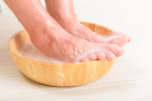 Male feets in a bowl — Stock Photo, Image