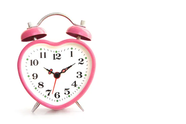 Pink alarm clock Stock Photo