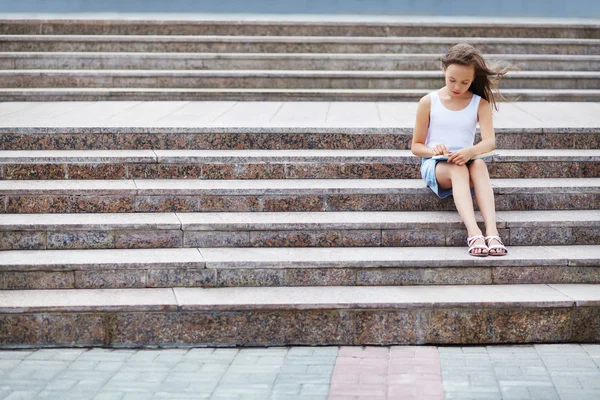 Girl on the stairs — Stock Photo, Image