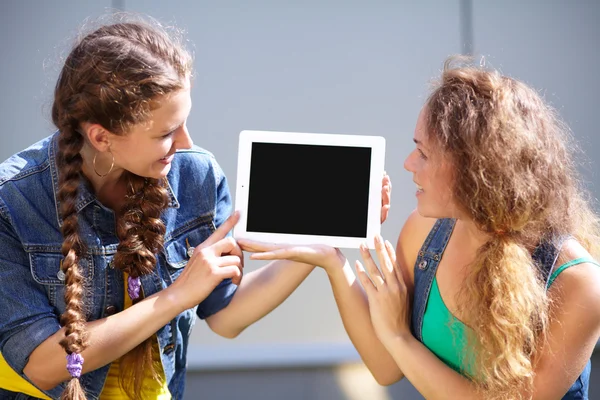 Two girls with tablet — Stock Photo, Image