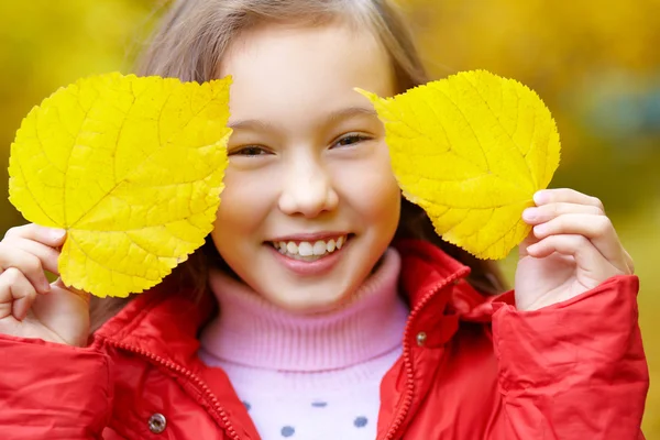 Girl with leaves — Stock Photo, Image