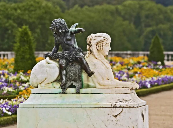 Sphinx och cupid — Stockfoto