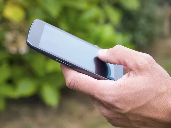 Man hand touching screen on modern mobile smart phone 3 — Stock Photo, Image