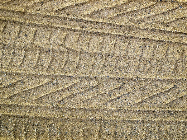 Koło ślady na piasku — Zdjęcie stockowe