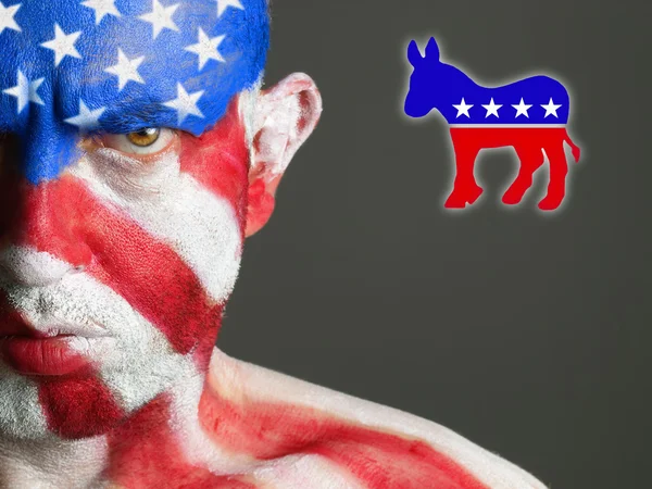 Man face flag EUA e símbolo democrata — Fotografia de Stock