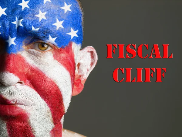 Man face flag of USA, sad expression and Fiscal cliff. — Stock Photo, Image