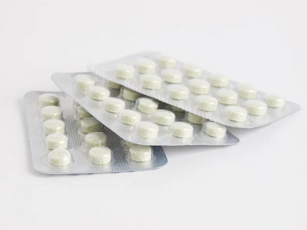 Drie pillen tabletten — Stockfoto