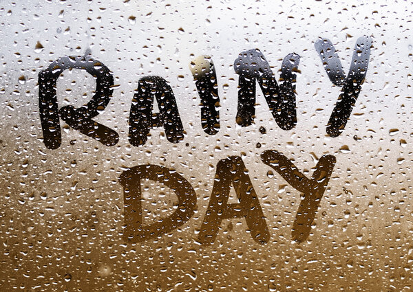 Text "RAINY DAY" written in a crystal