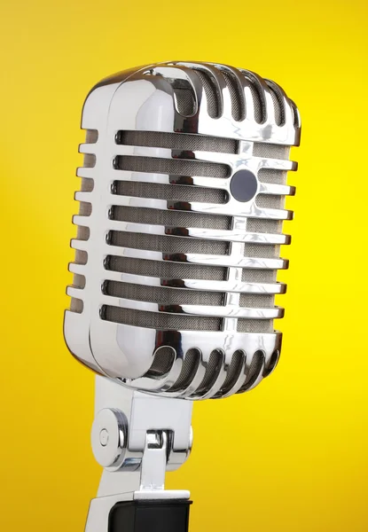 Microphone metal yellow background — Stock Photo, Image