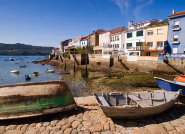 Wooden boats in a fishing village clipart