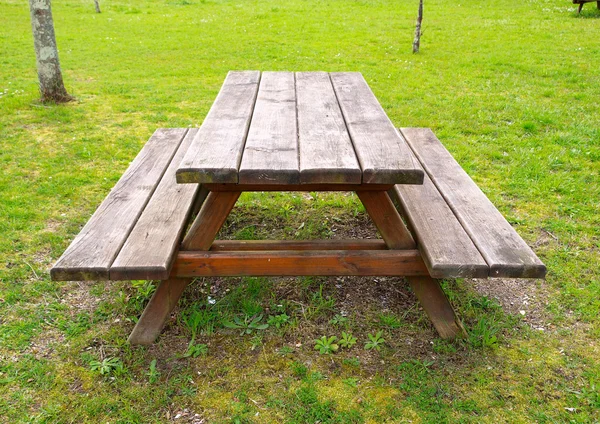 Table and benchs outdoors — Stock Photo, Image