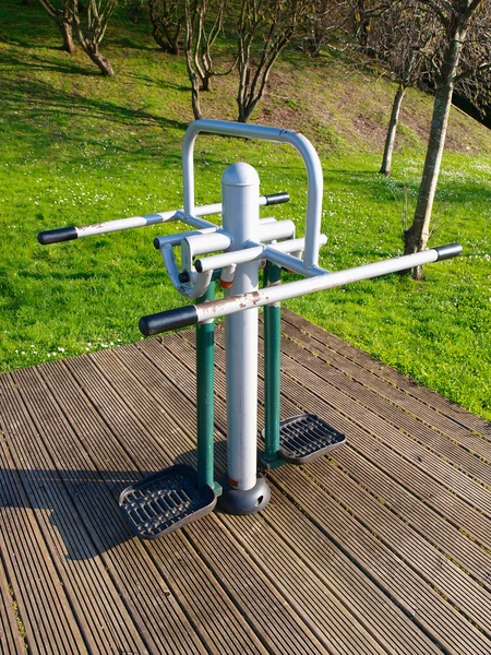 Exercise equipment in a park — Stock Photo, Image