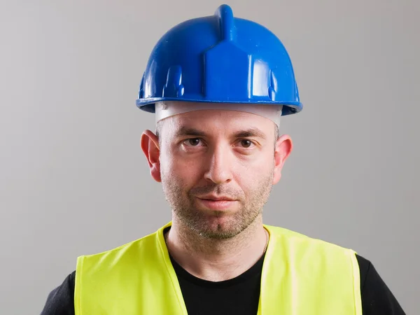 Portrait of a worker with serene expression — Stock Photo, Image