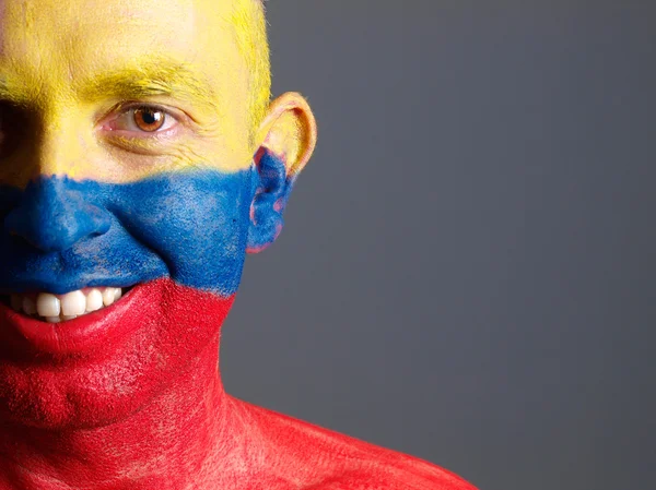 depositphotos_26356727-stock-photo-man-face-painted-with-colombian.jpg