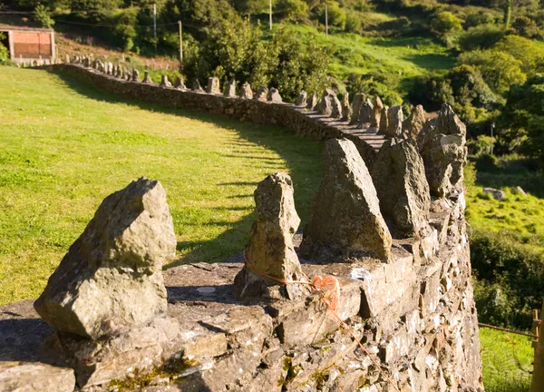 Low wall with stones in row — Stock Photo, Image