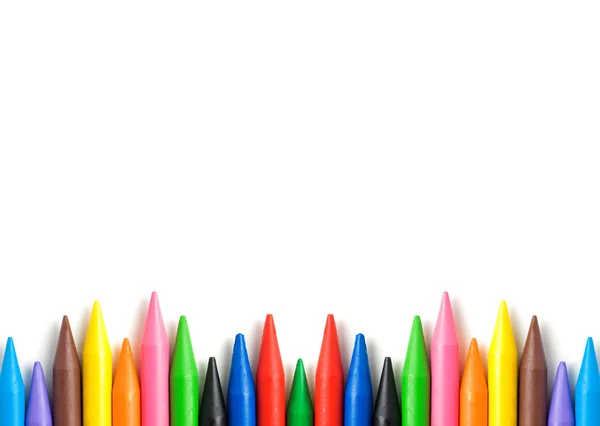 Een stapel van kleurrijke kleurpotloden met kopie ruimte. — Stockfoto