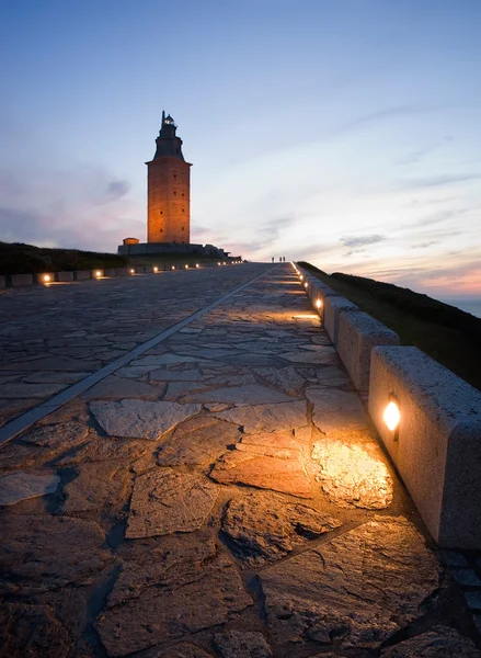 Torre de Hércules a hora azul — Fotografia de Stock