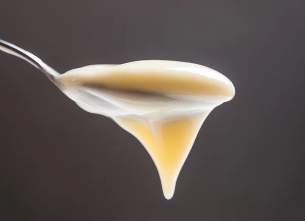 Spoon custard — Stock Photo, Image