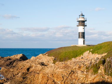 Lighthouse in Illa Pancha, Lugo, Galicia, Spain. clipart