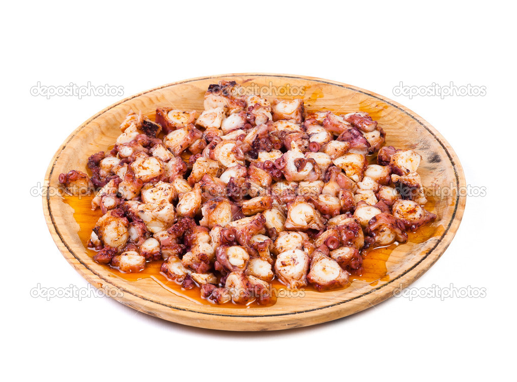Pulpo a feira in a wooden plate