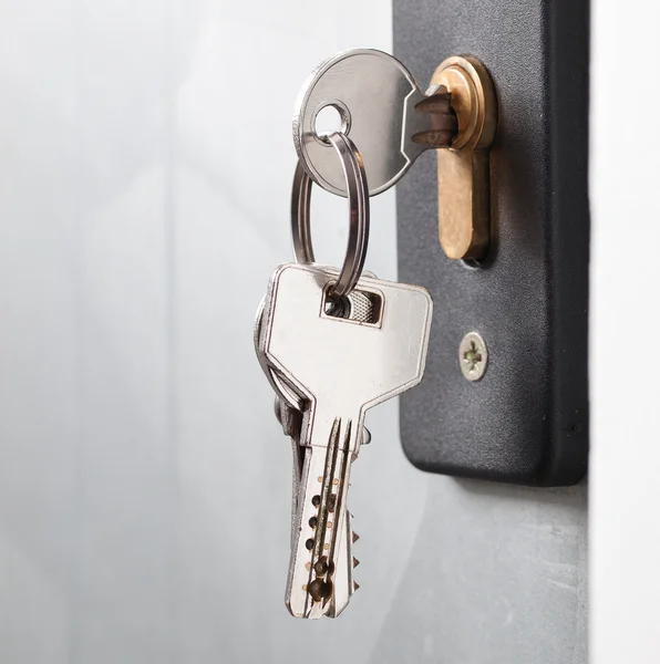 Keys stuck in a lock. — Stock Photo, Image