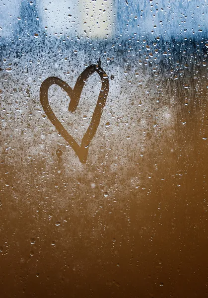Corazón pintado sobre vidrio . Imagen De Stock