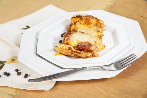 Lasagna with meat sauce and sausage — Stock Photo, Image