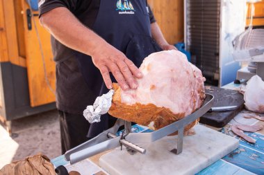 Whole cooked ham ready to be sliced