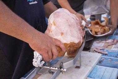 Whole cooked ham ready to be sliced