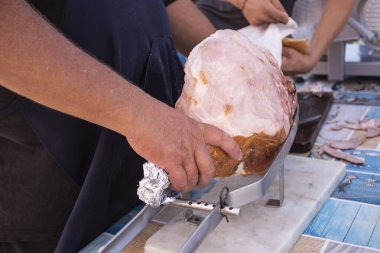 Whole cooked ham ready to be sliced