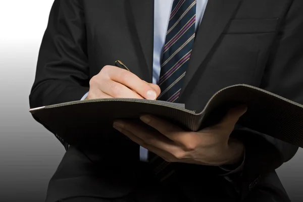 Businessman signing a contract — Stock Photo, Image