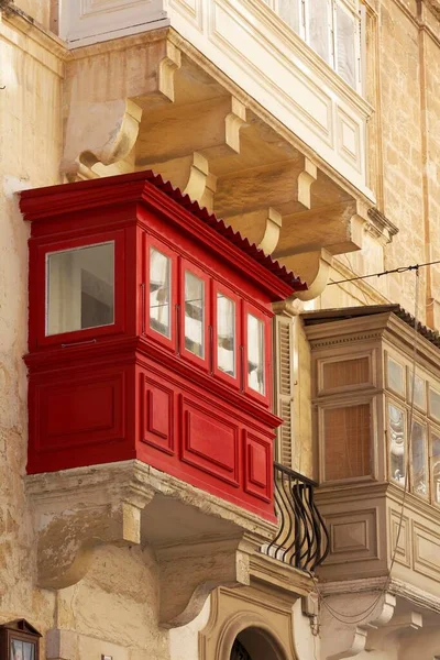 Red wooden bay window on facade, historic centre, Valletta, Malta, Europe