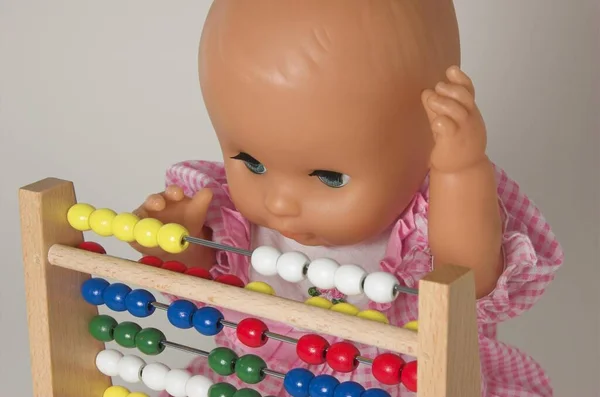 Learning Arithmetics Doll Using Abacus — Stock Photo, Image
