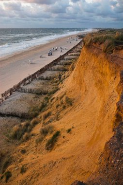 Cliff Rotes Kliff at the western coast of Sylt at sunset, Schleswig Holstein, Germany, Europe clipart