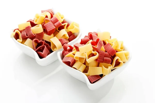 Coloured Heart Shaped Pasta White Dishes — Foto de Stock