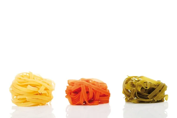 Coloured Tagliatelle Nests White Background Close View — Stock Photo, Image