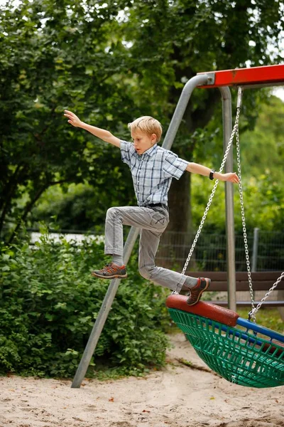 Boy Years Romping Playground Jumping Out Nest Swing — Stock Photo, Image