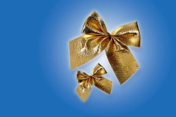 Golden Bows Blue Background — 스톡 사진