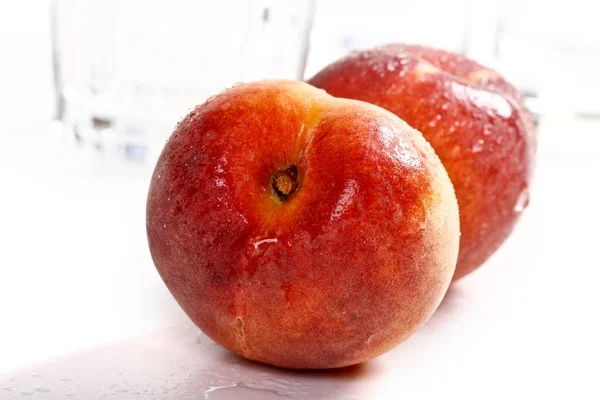 Two Peaches Close View — стоковое фото